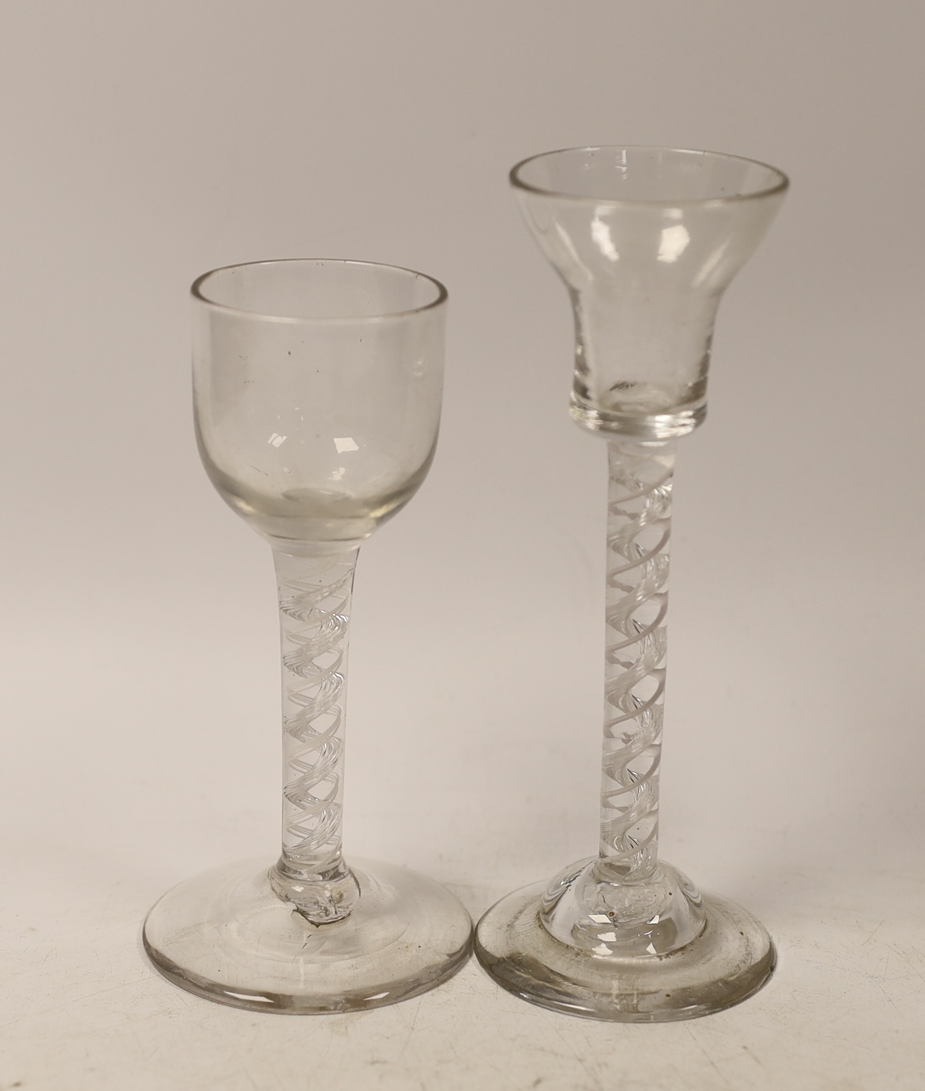 Two George II double series mixed twist cordial glasses, one with domed foot, tallest 16cm